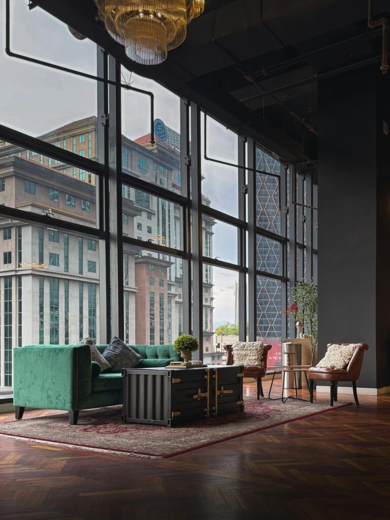 Elegant luxury penthouse lounge area with panoramic cityscape views