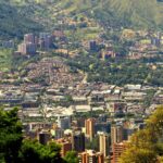 High-rise buildings in Medellín with mountain backdrop